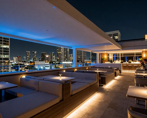 Rooftop bar in Brickell Miami at night with city lights