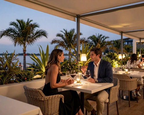 Elegant couple enjoying wine at a fine dining restaurant terrace in Orlando