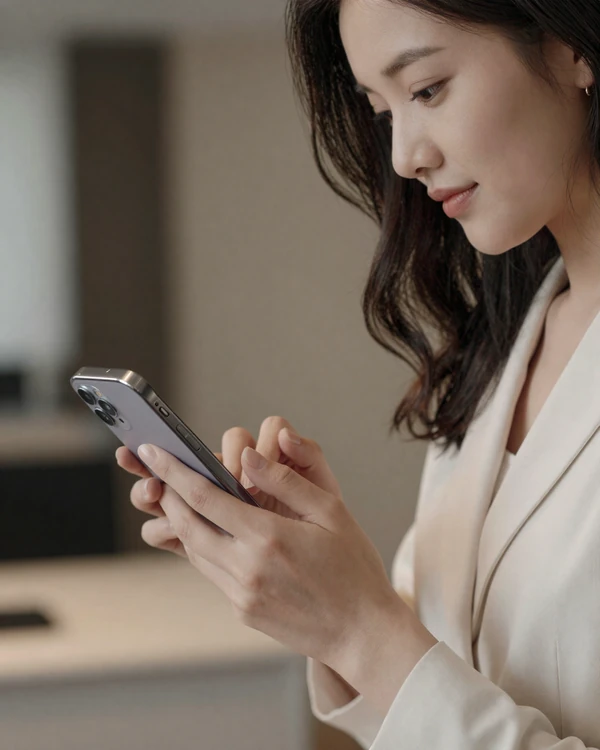Woman securely locking her smartphone in an elegant setting